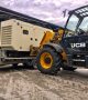 yeo valley holt farms unloading new aksa 150kva with jcb
