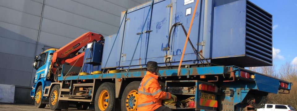 generator loaded and being removed from site for sale